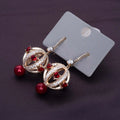 Golden Ruby Orbit Earrings